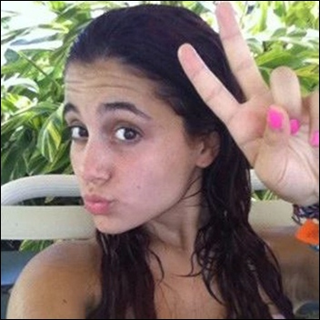 Ariana Grande swimming in pool